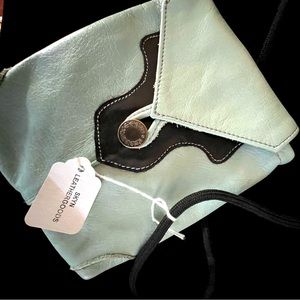NWT HANDMADE leather bag. Light blue, black accents.